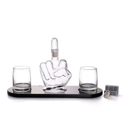 China OEM ODM Bottle Glass Wine Glass Beverage High Borosilicate Wine Decanter Logo Empty Middle Finger Shape Hot Wholesale Vodka Whiskey for sale