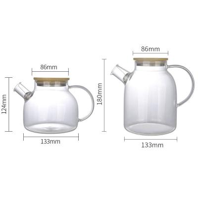 China Large Sustainable High Borosilicate Heat Resistant Glass Jug With Bamboo Lid for sale