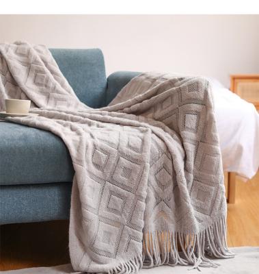 China Anti-Static America Style Knitted Blankets Soft Cozy Hotel Office Tassel Janquard Blankets Decorative Throws for sale