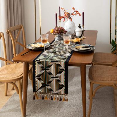 China Bohe table runner luxury geometric style retro style jacquard polyester flower tassels table runner for sale