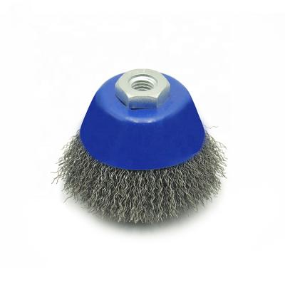 China Yellow Shell Steel Wire Brushes Twist Wire Cup Industrial Polishing Durable Copper Brush for sale