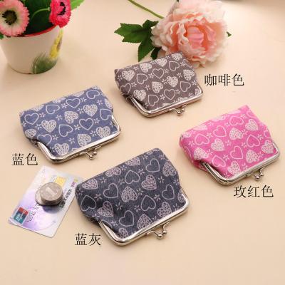 China New 2021 hot sale trend fashion fabric love buckle children anti-theft coin purse card bag key chain wallet mini small fresh women wholesale for sale