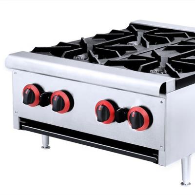 China Hotel commercial catering gas stove with 4 gas burners, gas stove with griddle oven and cabinet for sale