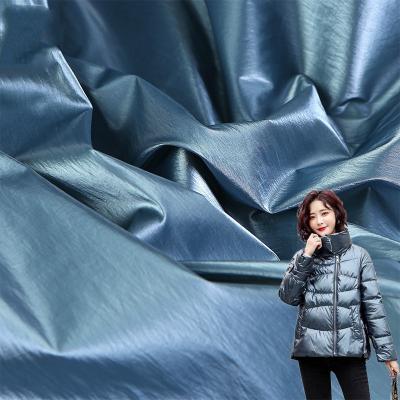 China 20D version nylon foil velvet paper version nylon fabricMetallic windproof membrane lamination paper fabric for down jacket for sale