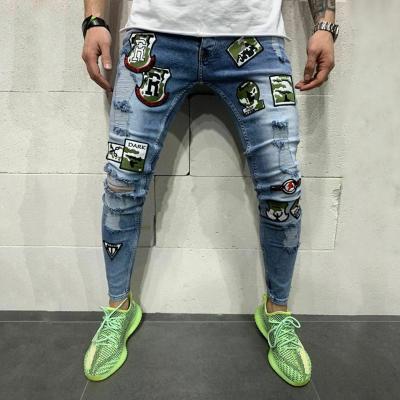 China New Breathable Gulidd Streetwear Men's Camouflage Patch Ripped Skinny Jeans Fashion Hole Male Stretch Casual Denim Pants for sale