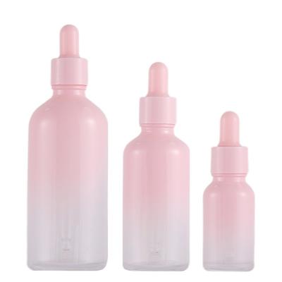 China 30ml 50ml 100ml Refillable Gradient Rose Serum Essential Oil Glass Dropper Bottle With Metal Cap for sale