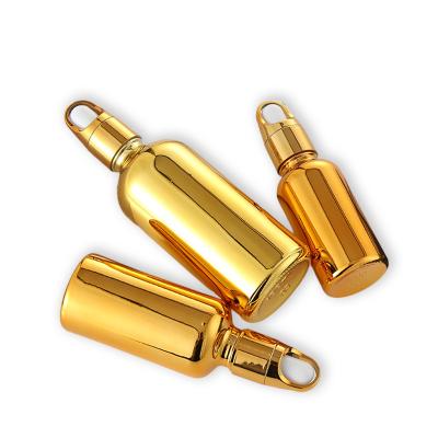 China Cosmetic Essential Oil Gold Coating Empty UV Gold 15ml 30ml 50ml / Silver Dropper Bottles For Oil for sale