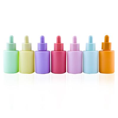 China 1oz 2oz 30ml 60ml Refillable Colorful Frosted Flat Shoulder Round Essential Oil Serum Dropper Glass Bottle With Dropper for sale