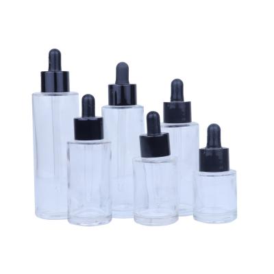 China 1/2oz 1oz 2oz Clear Shoulder Glass Essential Oil Cosmetic Bottle Flat Bottle With Dropper for sale