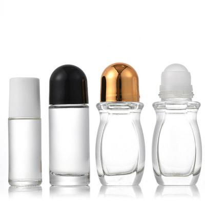 China Cosmetic High Quality Perfume Deodorant 30ml 50ml Clear Glass Roll On Bottle With Plastic Trackball for sale