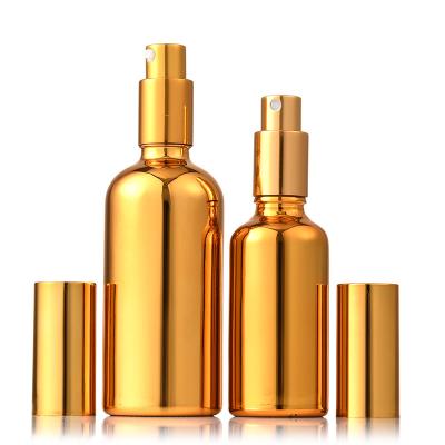 China 30ml 50ml 100ml Cosmetic Packaging Empty Round Gold Fine Mist Glass Spray Bottle With Sprayer for sale