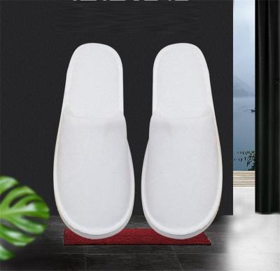 China Custom Black Color Disposable Hotel Slippers Travel Hotel Slippers White Disposable Hotel Slipper for sale