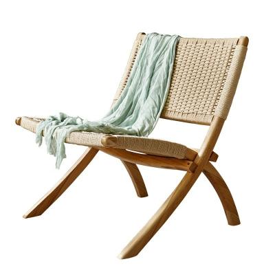 China Leisure Style Wooden Patio Outdoor and Living Room Folding Chairs with Natural Rattan Woven Craftsmanship for sale