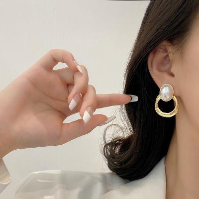 China TRENDY Korean Female Fashion Needle Earrings S925 Silver Female Fashion Minority Pearl Earrings Retro Circle Sense High Sense Earrings for sale