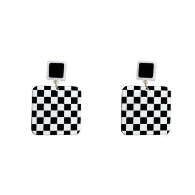 China FASHIONABLE black and white chessboard lattice 925 retro stiletto earrings women acrylic silver geometric pop earrings wholesale for sale