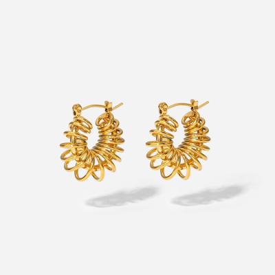 China Fashion Style 18k Gold Environmental Friendly Earrings Spiral Spring Hollow Wrapped Circle Earrings For Women for sale