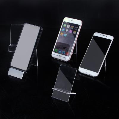 China Universal Mini Portable Clear View Acrylic Stand Shelf Display Stand Mobile Desktop Holder Mobile Cell Phone Shows Stand Holder for sale