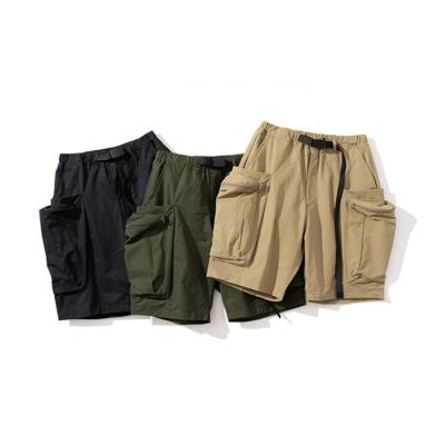 China Anti-Wrinkle Mens Cotton Cargo Shorts With Large Pockets Solid Color Street Wear Elastic Waist Casual Short Pants for sale