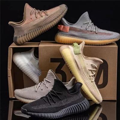 China Original fashion trend quality sports running shoes women yezzy fashion sneakers men's yezzy slides for sale