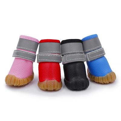 China Sustainable Wholesale Waterproof PU Leather Dog Shoes Winter Pet Warm Fashion Black Boots for sale