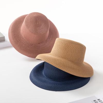 China Wide Side Hat Hepburn Style Straw Hat Image Summer Women Vintage Design Solid Color Beach Vacation Beach Hat for sale