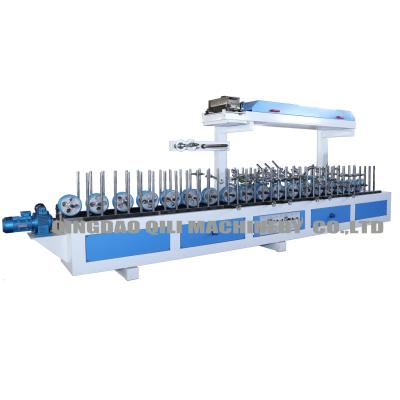 China Hotels QILI Woodwork Cold Glue WPC Door Frame Profile Wrapping Machine for sale