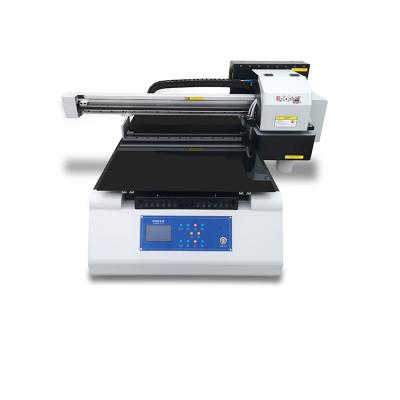 中国 6090 plastic flatbed printers 6090 plastic flatbed printer impresora uv inkjet mug printing machine pet pvc film printer 販売のため