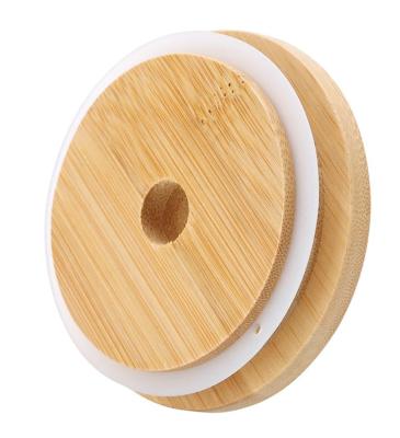 China Non-refillable eco bamboo lid with center Holewith silicone ring pump bamboo cosmetic bottle bamboo lid packaging for sale