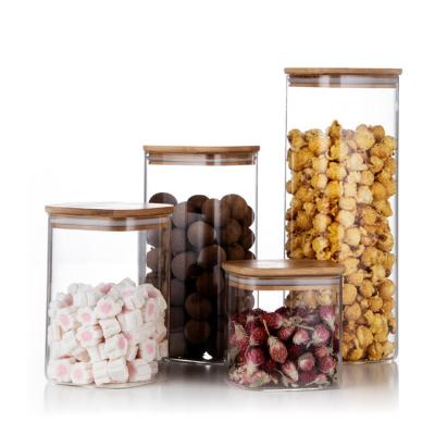 China Wholesale Airtight Kitchen Square Glass Freshness Food Food Jar With Lid Glass Bamboo Bottle for sale