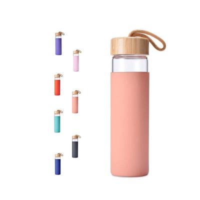 China Sustainable Wholesale Reusable Bamboo Travel Mug Eco - Friendly Glass Cup With Bamboo Lid for sale