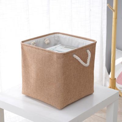 China Viable Folding Cloth Cube Bathroom Makeup Organizer Storage Bin Foldable Desktop Sundries Storage Basket for sale