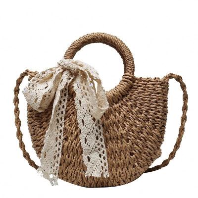 China High Quality Made in China Women Fashion Metal Ring Hand Grip Straw Wheat Bag for sale