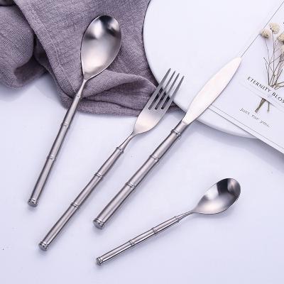 China PVD Color Metal Round Handle Flatware Set 4 Pcs 18/8 Stainless Steel Flatware for sale