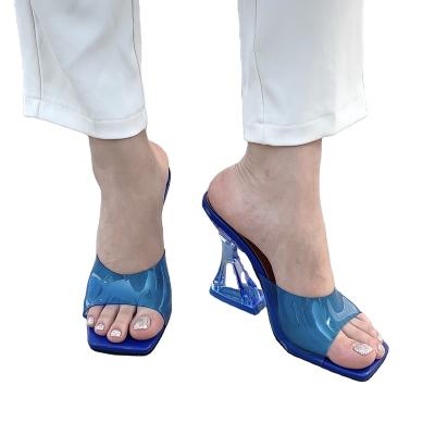 China New PVC high-heeled sandals in the spring and summer 2023 thick heel sandals walking shoes transparent crystal word slippers one for sale