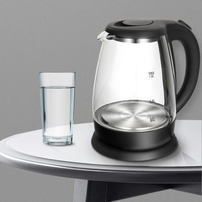 China Hotel Transparent Boil-Dry Price Pad Tea 1500w Water Quickly Boil Hot Glass Electric Jug Kettle for sale