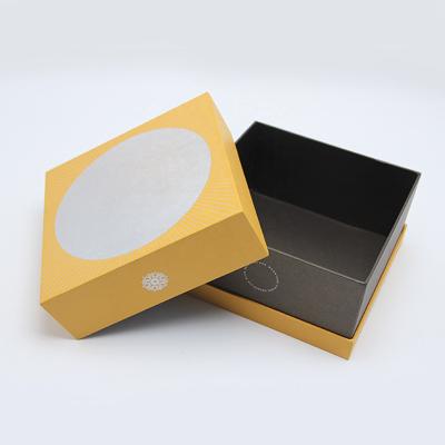 China Recycled Materials Custom Clothes Shoes Packaging Cardboard Folding Packaging Gift Box With Seal Paper Cut Corrugated Paper Light Weight Box for sale