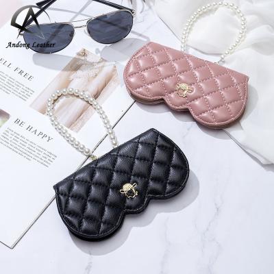 China Andong Hangable Genuine Leather Portable Sunglasses Female Case Bag Glasses Bags Genuine Sheepskin Leather Protective Fashion Women Pinch Pocket for sale