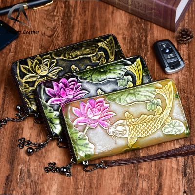 China Andong embossed ladies long wallet summer retro long wallets genuine ethnic hand-painted cowhide waterproof style purse clutch phone bag for sale