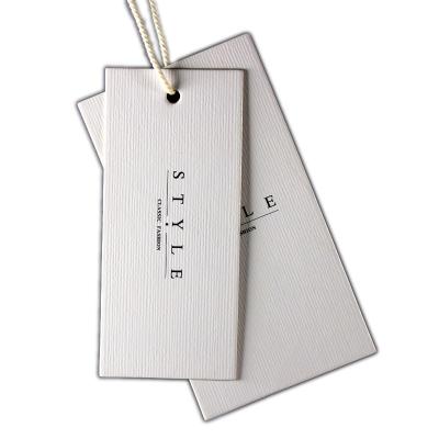 China Viable Free Custom Design Logo Plastic Hang Tags For Clothing for sale