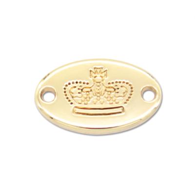 China Washable Gold Color Oval Shape Metal Label With Custom Logo Engraved For Hat / Apparel / Scarf for sale