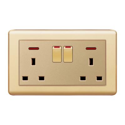 China HOME USE China Good Quality Double Color 13A Golden Light Lamp Switches And Socket for sale