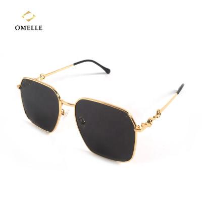 China OMELLE 2021 Gradient Irregular Lens Frame Fashion Metal Women Oversized Sunglasses for sale