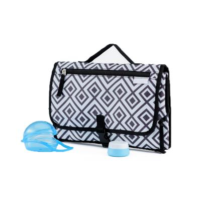 China Single Pack China Supplier Waterproof Foldable In A Portable Changing Diaper Clutch Pad for sale