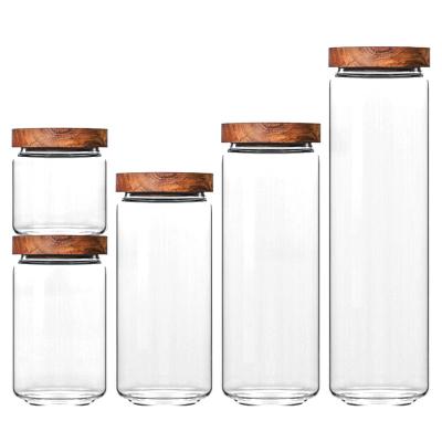 China Sustainable hot sale kitchen storage airtight glass jar with wooden lid air tight glass jar with bamboo lid for sale