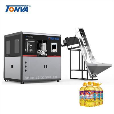 China Semi Automatic Bottle PET Edible Oil Bottle Blow Molding Machine And Semi Automatic for sale