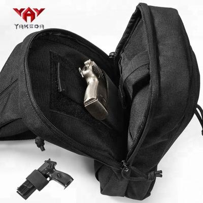 China YAKEDA Multifunctional Waterproof Sling Gun Bag Quickly Move Other Police Pistol Shotgun To Hide Small Pack Chest Sling Bag Messenger Military Black Tactical Bags for sale