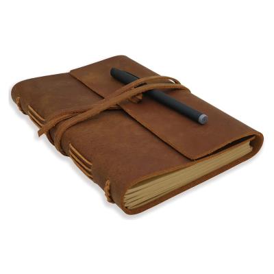 China Universal Softcover Daily Planner Vintage Journal Genuine Leather Bound Diary Writing Notebook Lined Kraft Paper Pages for sale