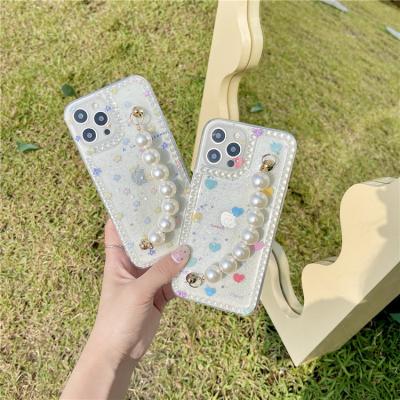 China Shiny Anti-fall Fashion Clear Soft Cover Pearl Wrist Strap Printing Phone Case For iPhone 12 11Pro Xs Max XR Max for sale