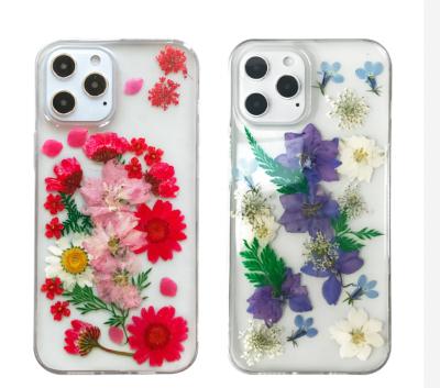 China 2021 Anti-fall flower phone cover designer hot sale epoxy dry pressed clear clear protective case real for iphones 11 pro 12 max for sale