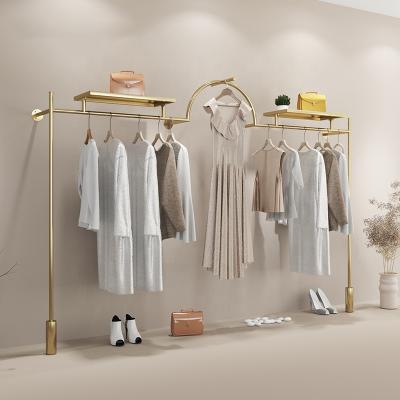 China Morden Boutique Clothing Store Shelf Rack Wall Mounted Garment Clothes Rack Clothes Display Stand Gold Clothing Rack for sale